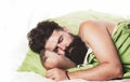 Sleepy and lazy person slowly posing alone. Man sleep in bed alone. Boy sleeping and dreaming. Joyful man sleeping on a Royalty Free Stock Photo