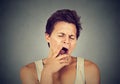 Sleepy man yawning stretching Royalty Free Stock Photo