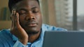 Sleepy overworked tired african american man employee manager businessman fall asleep at office desk sleeping napping Royalty Free Stock Photo