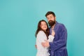 Sleepy people blue background. Couple sleepy faces domestic clothes. All day pajamas. Couple in love bathrobes. Drowsy