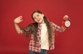 sleepy teen girl hold retro alarm clock, awakening