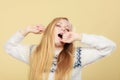 Sleepy yawning teenage woman in jumper