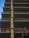 Sleeve for dumping debris at a construction site Down up. View from below. Frame of a concrete structure