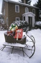 Sleigh With Presents on Lawn