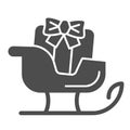 Sleigh solid icon. Sledge with bag of gifts and presents symbol, glyph style pictogram on white background. Christmas Royalty Free Stock Photo