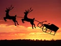 Sleighs and reindeer fly in the sky Royalty Free Stock Photo