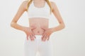 Slender sporty woman touching her belly Royalty Free Stock Photo
