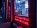 Slgo, Ireland: 12.05.2021: Fast food take away neon sign. Town night scene. Christmas time, festive season Royalty Free Stock Photo