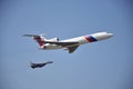 Sliac, Slovakia - August 27, 2011: Flight display of jet airliner Tupolev Tu-154M escorted by jet air figh