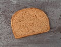 Slice of all natural stone ground whole wheat bread Royalty Free Stock Photo