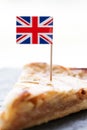 Slice of apple pie and british flag, tart dessert and sweet food