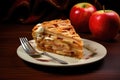 slice of apple pie with fork on white plate Royalty Free Stock Photo