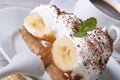 Slice Banoffee pie with cream and coffee macro horizontal