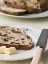 Slice of Barm Brack with Butter Royalty Free Stock Photo