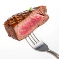 Slice of beef steak on a fork isolated on transparent background Royalty Free Stock Photo