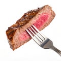 Slice of beef steak on a fork isolated on transparent background Royalty Free Stock Photo
