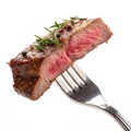 Slice of beef steak on a fork isolated on transparent background Royalty Free Stock Photo