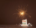 Slice of Birthday Cake with Sparkler Royalty Free Stock Photo