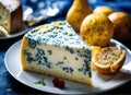 Slice of blue cheese or Roquefort on a plate