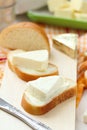 Slice of bread with cream cheese and butter for breakfast Royalty Free Stock Photo