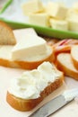 Slice of bread with cream cheese and butter for breakfast Royalty Free Stock Photo