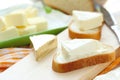 Slice of bread with cream cheese and butter for breakfast Royalty Free Stock Photo