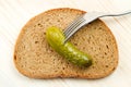 Slice of bread, cucumber on a fork Royalty Free Stock Photo