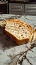 A slice of bread on a marble counter Royalty Free Stock Photo