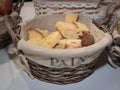Slice of Bread Rolls and French Loaf inside Wicker Basket Royalty Free Stock Photo