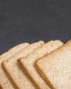 Slice of bread on the slate cheese board Royalty Free Stock Photo