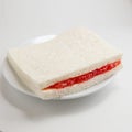 Slice of bread with strawberry jam Royalty Free Stock Photo
