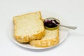 Slice of breads on the white disc isolate background Royalty Free Stock Photo