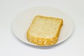 Slice of breads on the white disc isolate background Royalty Free Stock Photo