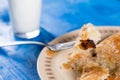 Slice of burek on the fork with blurred background Royalty Free Stock Photo