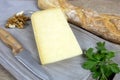 Slice of Cantal cheese on a table