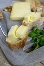 slice of Cantal cheese on a table