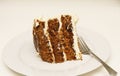 Slice of Carrot Cake on Plate with Fork Royalty Free Stock Photo