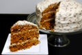 Slice of Carrot Cake with Whole Cake Royalty Free Stock Photo