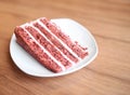 Slice of carrot pie on a white plate