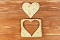 Slice of cereal toast bread with cut out heart Royalty Free Stock Photo