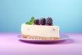 Slice of cheesecake cake with blackberry fruits on pastel background
