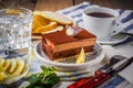 Chocolate cake and a cup of tea, water with ice and slices of pe Royalty Free Stock Photo