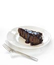 Slice of chocolate cheesecake on white plate Royalty Free Stock Photo