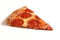 Slice of classic original Pepperoni Pizza isolated on white background Royalty Free Stock Photo