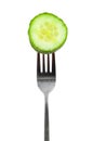 Slice of cucumber on a fork Royalty Free Stock Photo