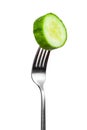 Slice of cucumber on a fork Royalty Free Stock Photo