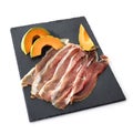 slice of cured ham and melon