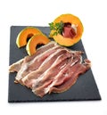 slice of cured ham and melon