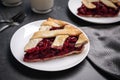 Slice of delicious fresh cherry pie on grey table, closeup Royalty Free Stock Photo