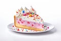 A slice of a delicious, frosted birthday cake featuring a decorative design and pastel colors